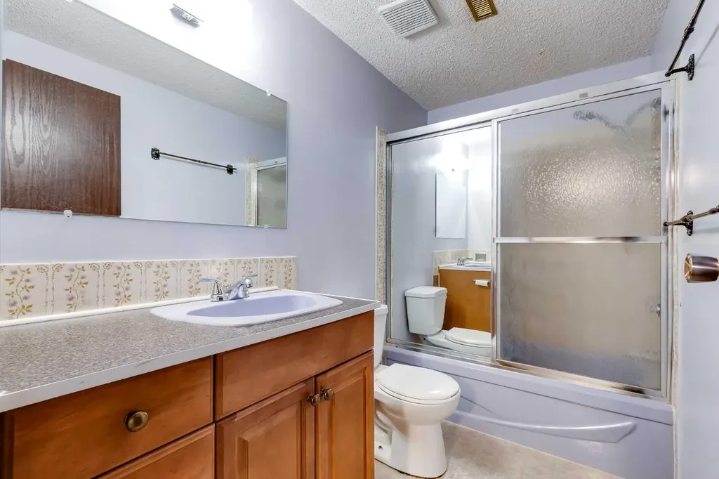 248 Huntcroft Road NE Calgary AB T2K 4E2