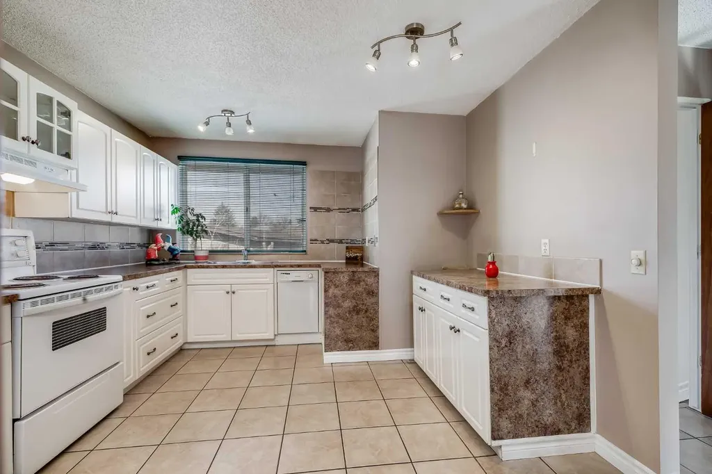 248 Huntcroft Road NE Calgary AB T2K 4E2