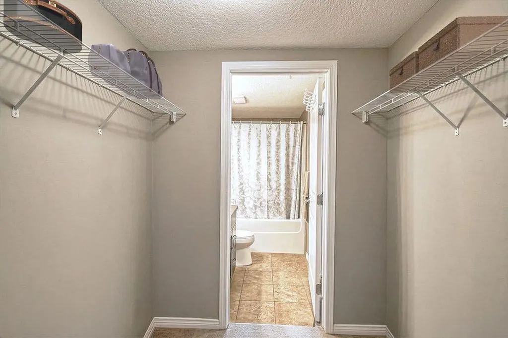 175 Panatella Hill NW Calgary AB T3K 0V9