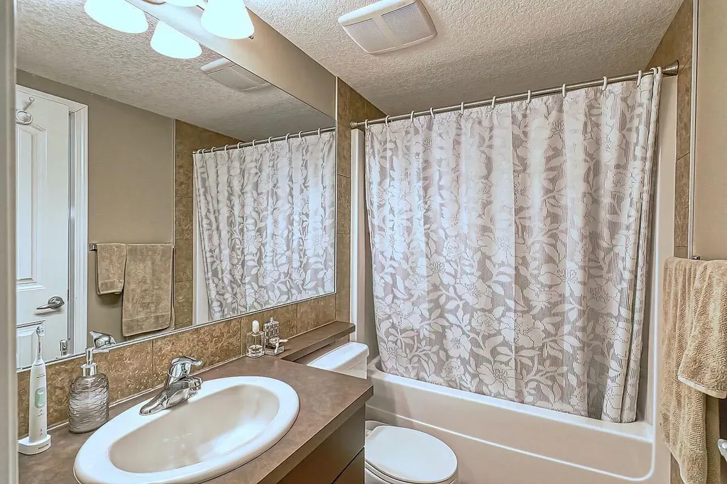 175 Panatella Hill NW Calgary AB T3K 0V9