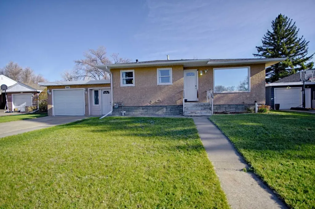 4925 53 Avenue Taber AB T1G 1H5