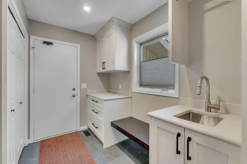28 Woodacres Way SW Calgary AB T2W 4W3