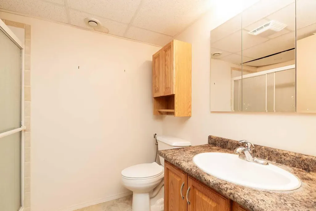 52 Trent Road W Lethbridge AB T1K 4N3