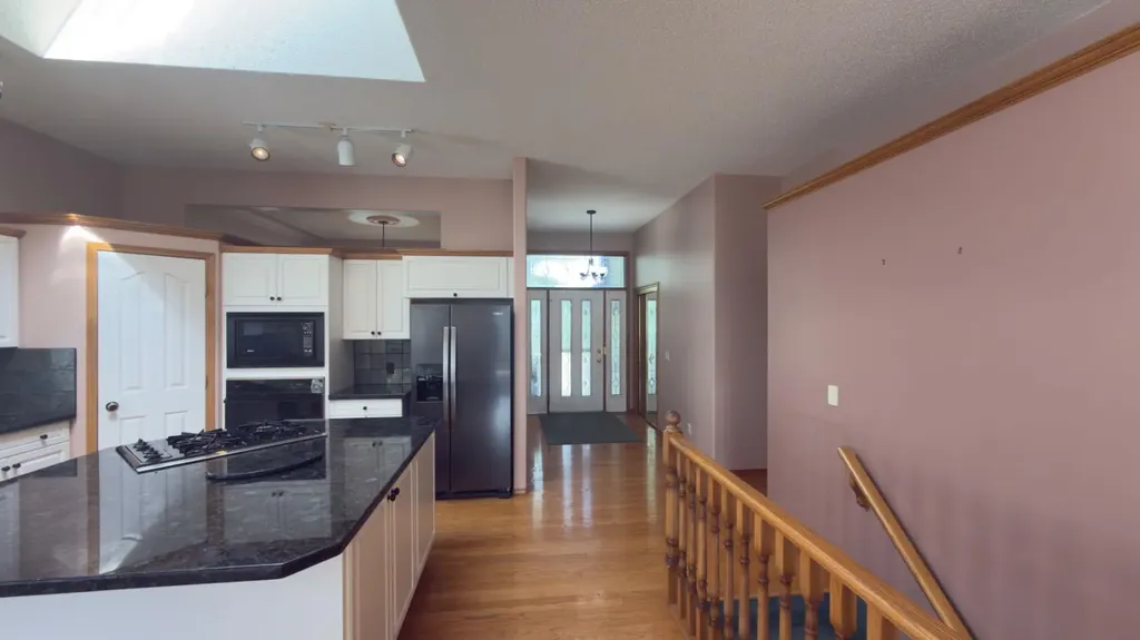 117 Woodpark Close SW Calgary AB T2W 6H1