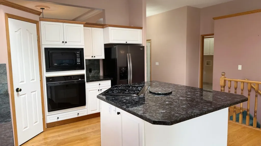 117 Woodpark Close SW Calgary AB T2W 6H1