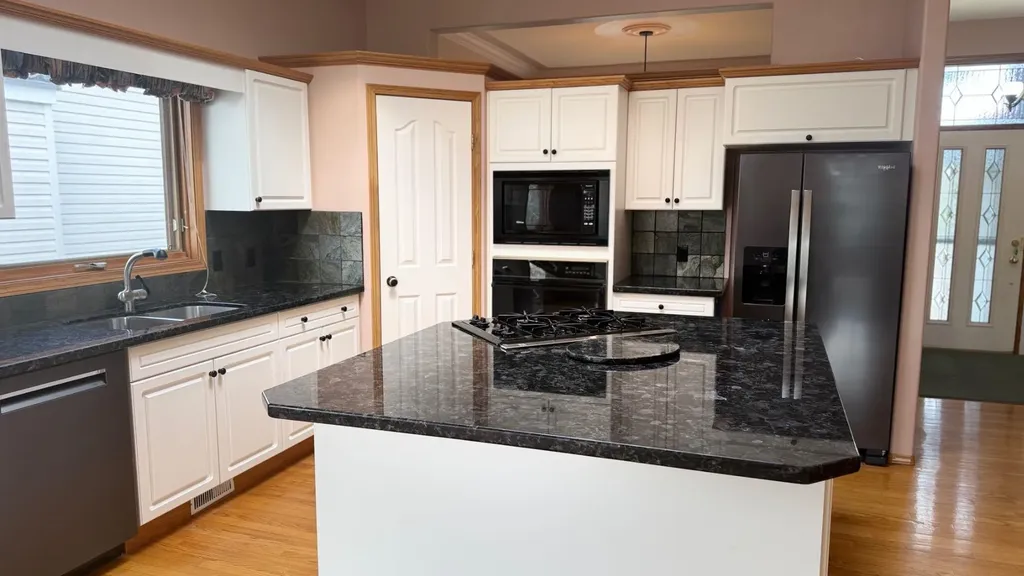 117 Woodpark Close SW Calgary AB T2W 6H1