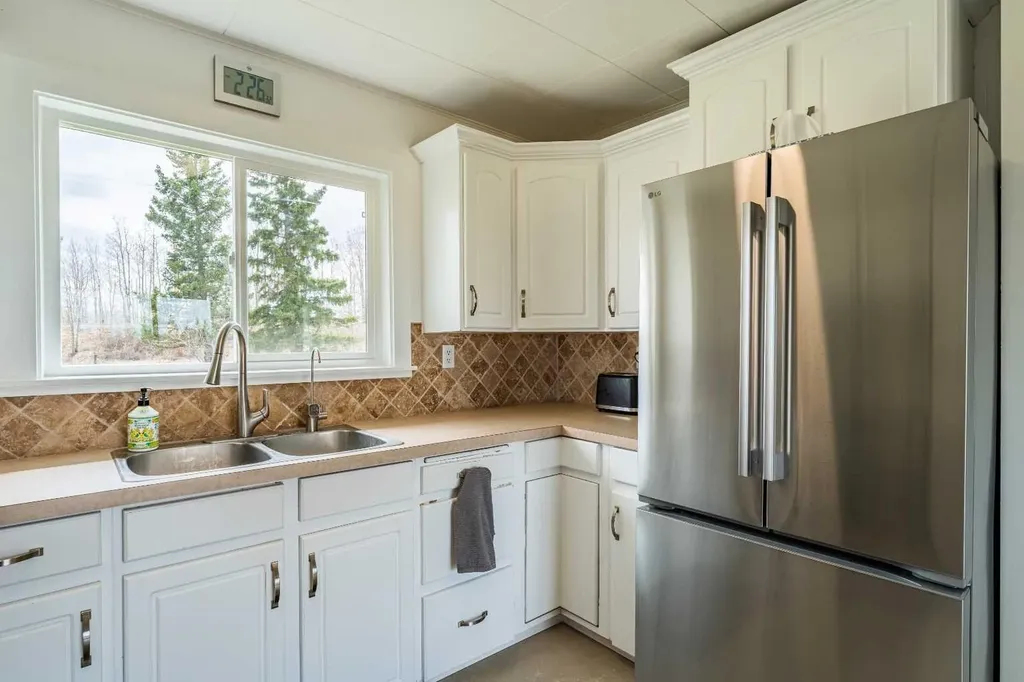 370 16 Avenue Diamond Valley AB T0L 2A0