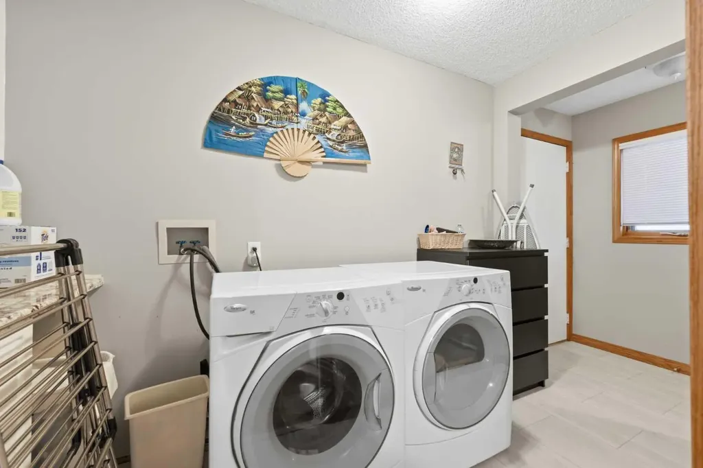 71 Woodpark Close SW Calgary AB T2W 6G9
