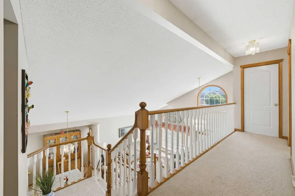 71 Woodpark Close SW Calgary AB T2W 6G9