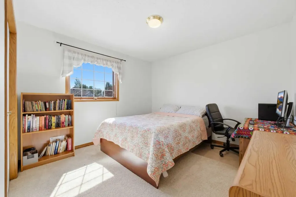 71 Woodpark Close SW Calgary AB T2W 6G9