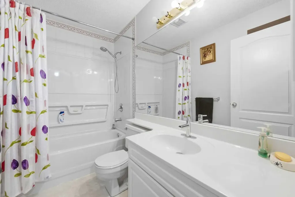 71 Woodpark Close SW Calgary AB T2W 6G9