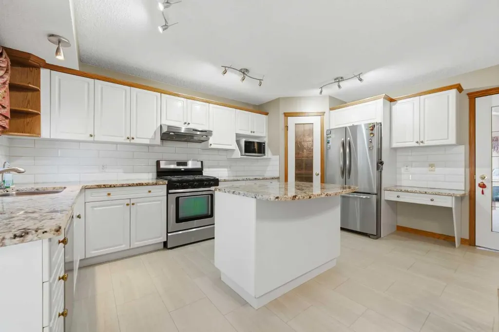 71 Woodpark Close SW Calgary AB T2W 6G9
