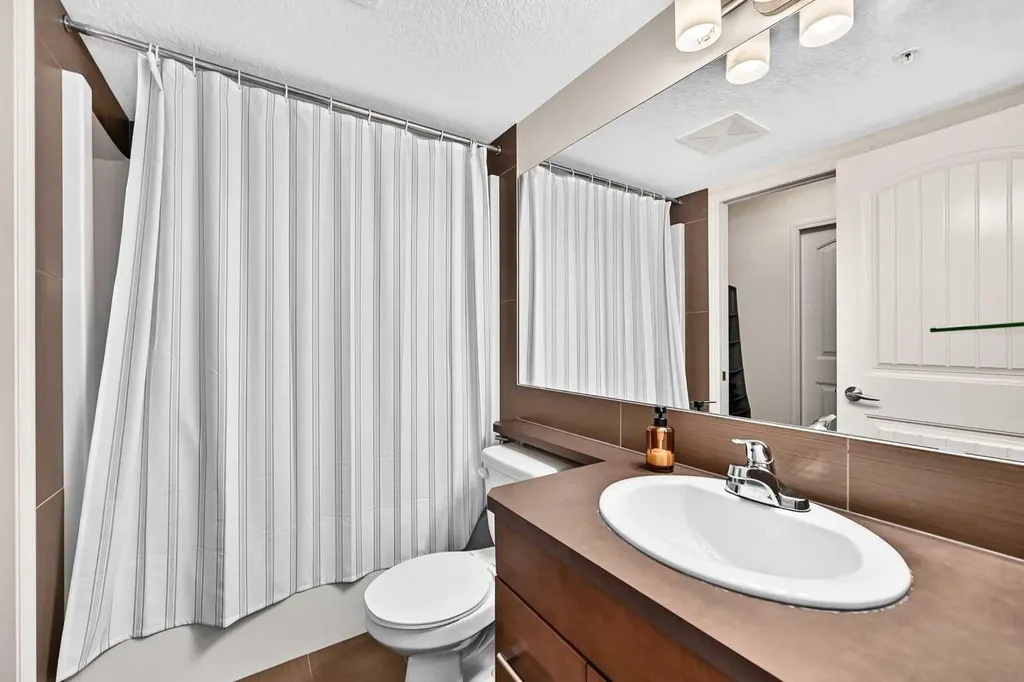 175 Panatella Hill NW Calgary AB T3K 0V9
