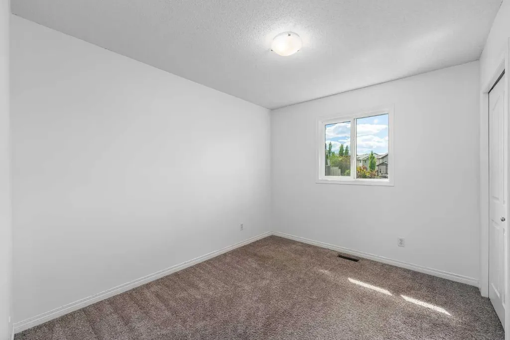 15 Panora Square NW Calgary AB T3K 0R8