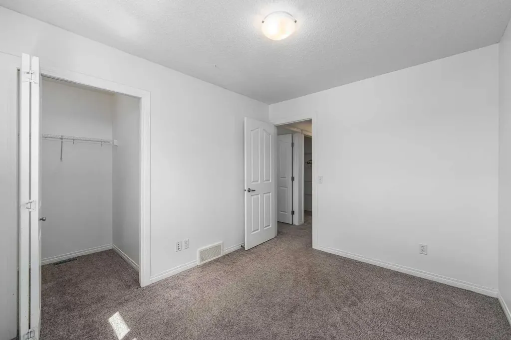 15 Panora Square NW Calgary AB T3K 0R8
