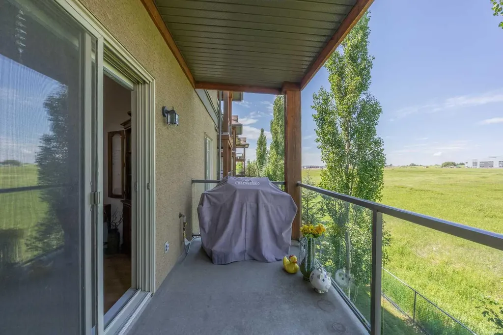 92 Crystal Shores Road Okotoks AB T1S 2N2