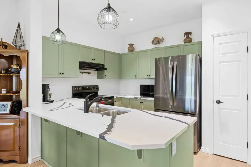 92 Crystal Shores Road Okotoks AB T1S 2N2
