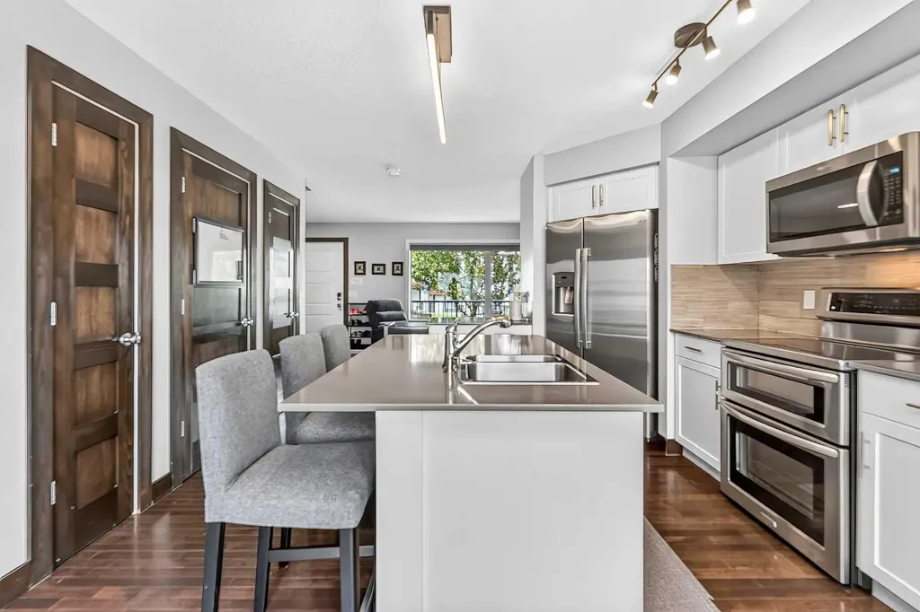 102 Panatella Hill NW Calgary AB T3K 0B6