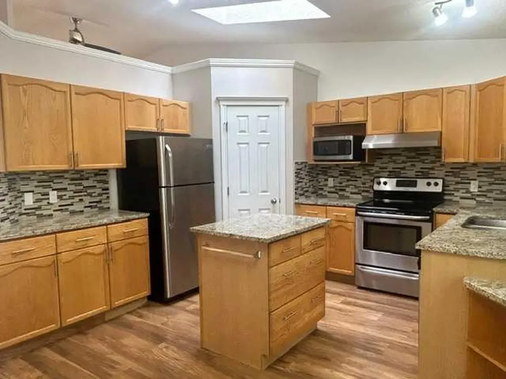 159 Woodbend Way Okotoks AB T1S 1M7
