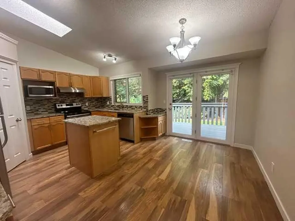 159 Woodbend Way Okotoks AB T1S 1M7