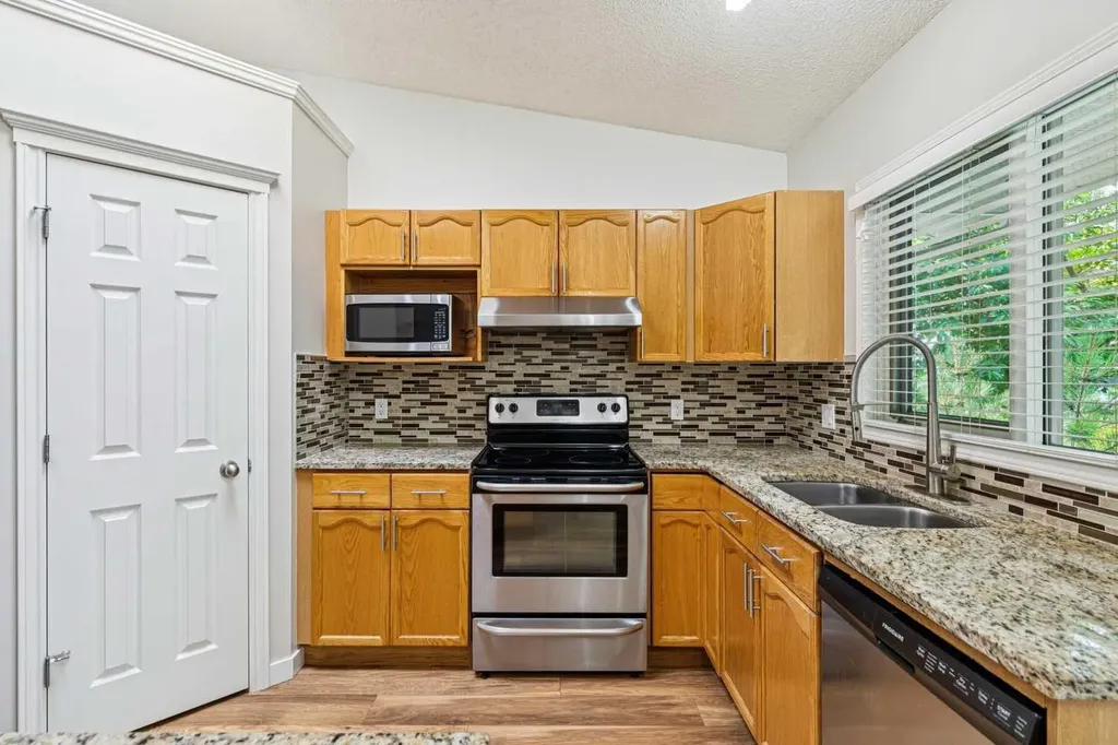 159 Woodbend Way Okotoks AB T1S 1M7