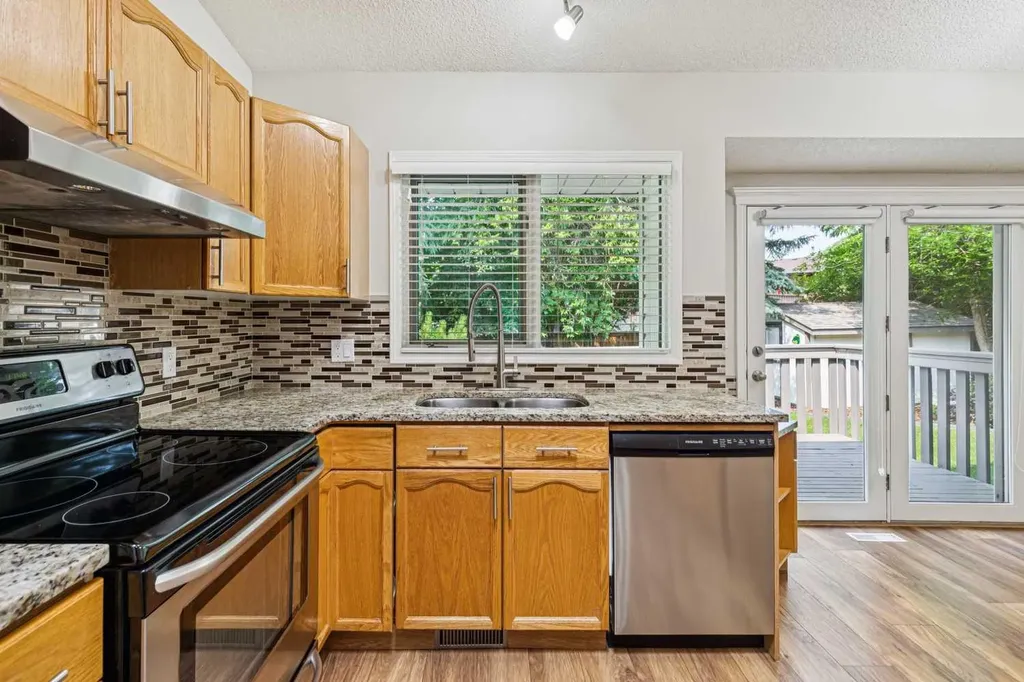 159 Woodbend Way Okotoks AB T1S 1M7