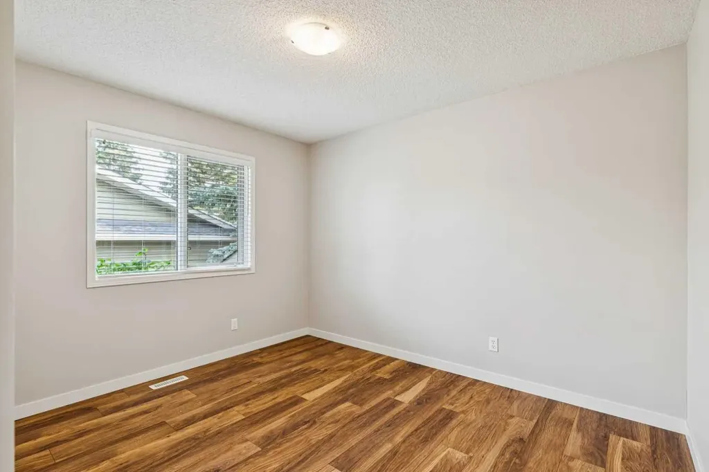 159 Woodbend Way Okotoks AB T1S 1M7