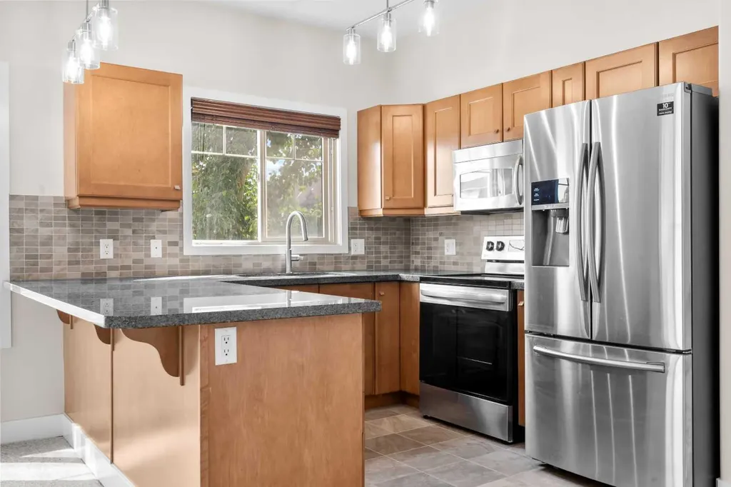 92 Crystal Shores Road Okotoks AB T1S 2N2