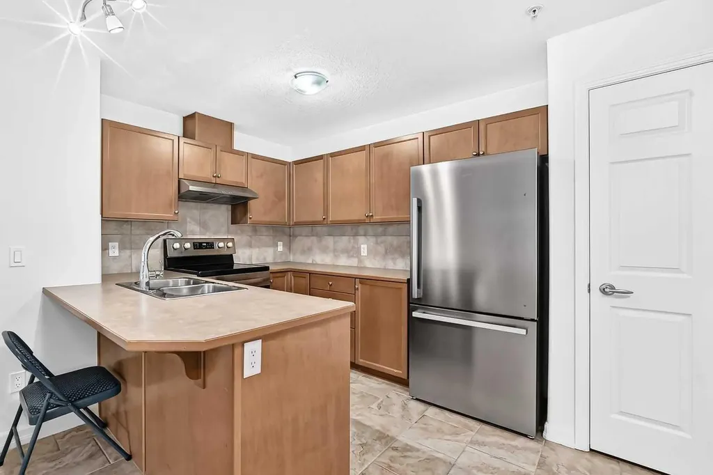 92 Crystal Shores Road Okotoks AB T1S 1N1