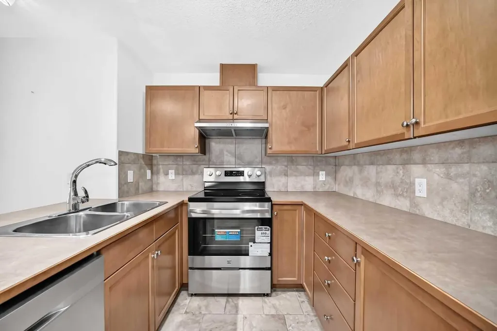 92 Crystal Shores Road Okotoks AB T1S 1N1