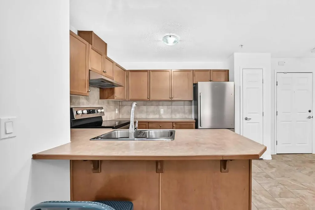 92 Crystal Shores Road Okotoks AB T1S 1N1