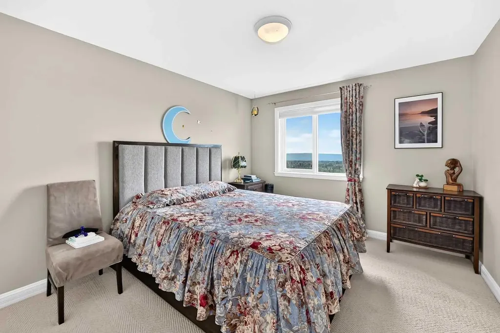 311 Rocky Ridge Drive NW Calgary AB T3G 4P4