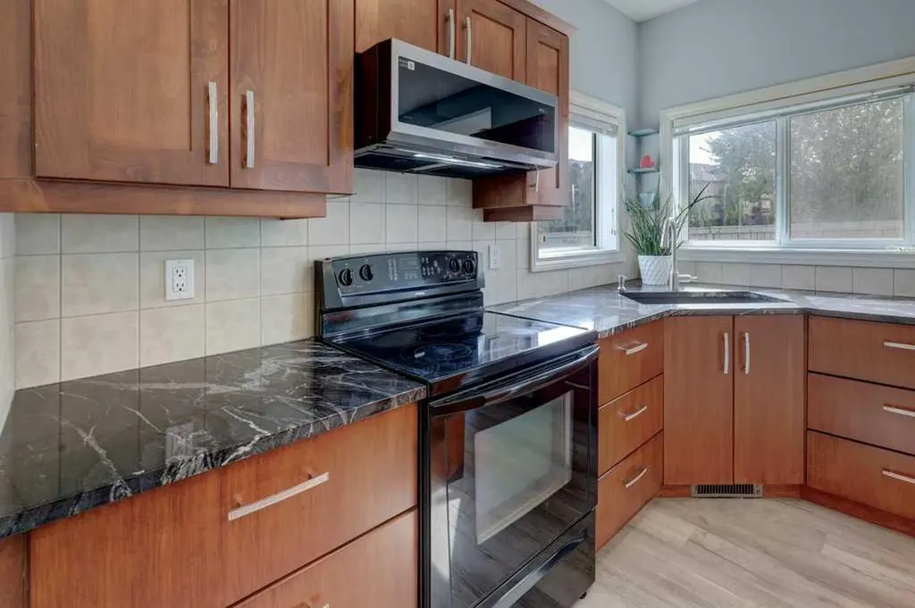 242 Crystal Green Point Okotoks AB T1S2K7