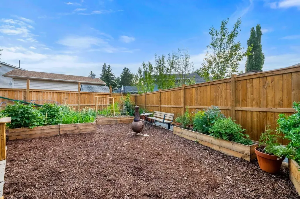 148 Woodridge Drive SW Calgary AB T2W 5M2
