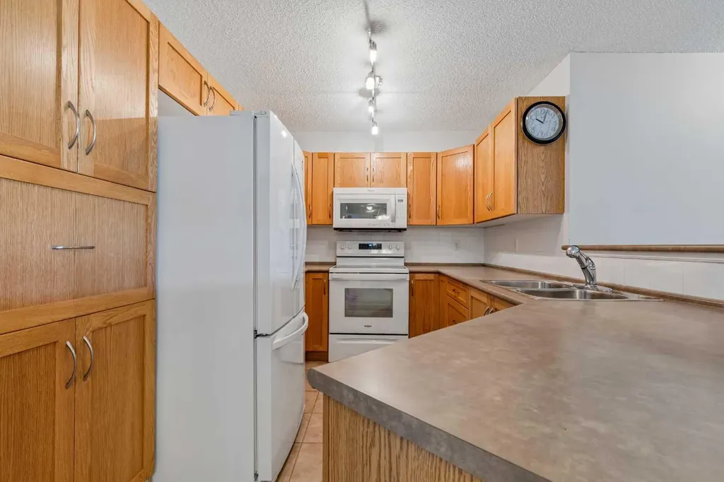 304 Mackenzie Way SW Airdrie AB T4B 3H7