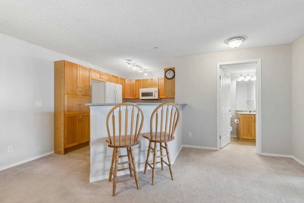 304 Mackenzie Way SW Airdrie AB T4B 3H7