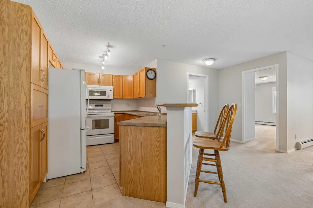 304 Mackenzie Way SW Airdrie AB T4B 3H7