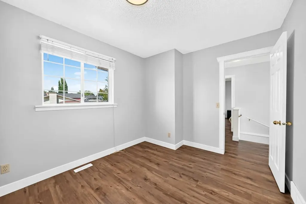144 Riverstone Crescent SE Calgary AB T2C 4A3
