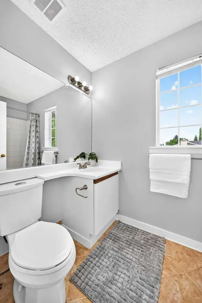 144 Riverstone Crescent SE Calgary AB T2C 4A3