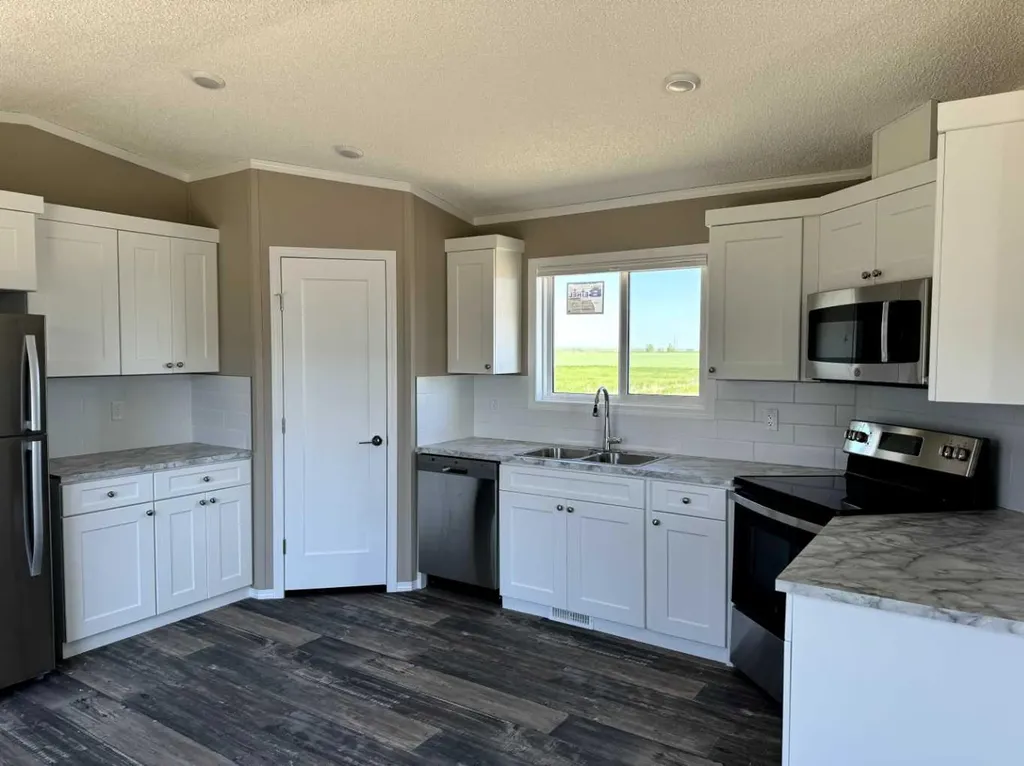 6, 10, 14 Meadows Crescent Taber AB T1G 0G7
