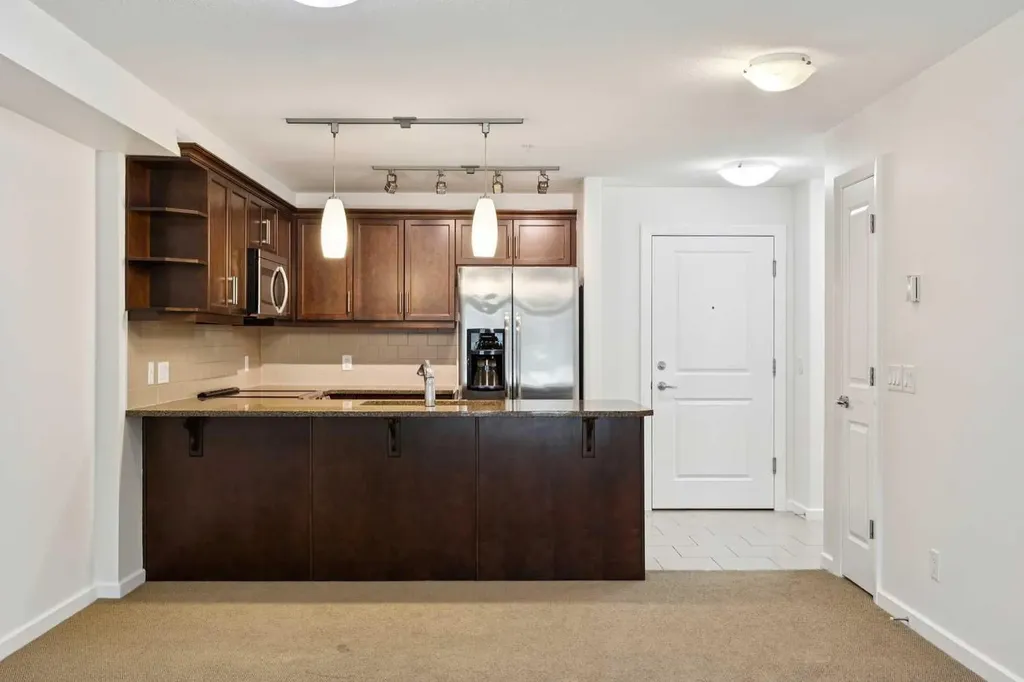 310 Mckenzie Towne Gate SE Calgary AB T2Z 1J4