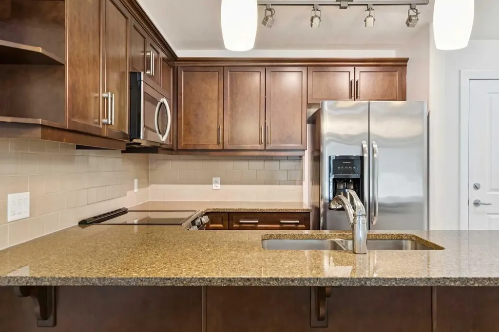 310 Mckenzie Towne Gate SE Calgary AB T2Z 1J4