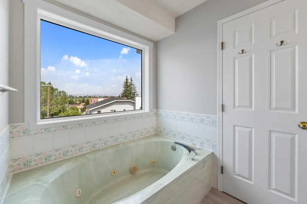 226 Sandstone Drive NW Calgary AB T3K 3B9
