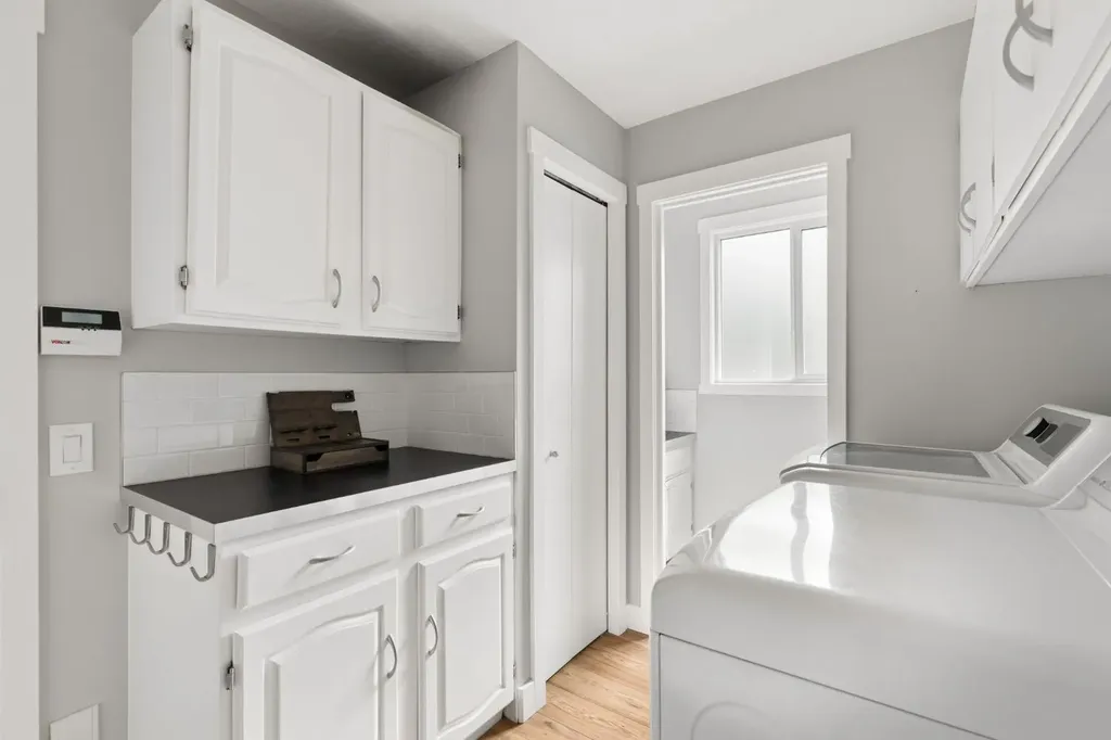 692 Woodpark Boulevard SW Calgary AB T2W 3R7