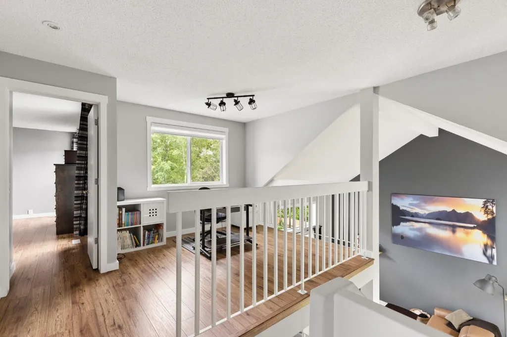692 Woodpark Boulevard SW Calgary AB T2W 3R7