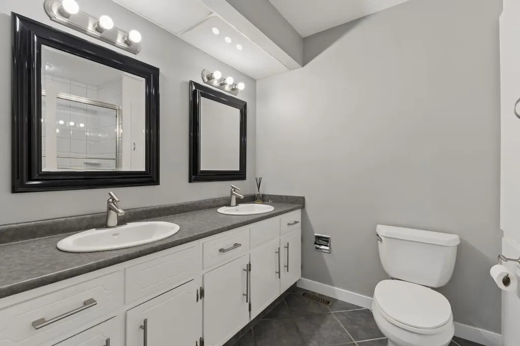 692 Woodpark Boulevard SW Calgary AB T2E 3R7