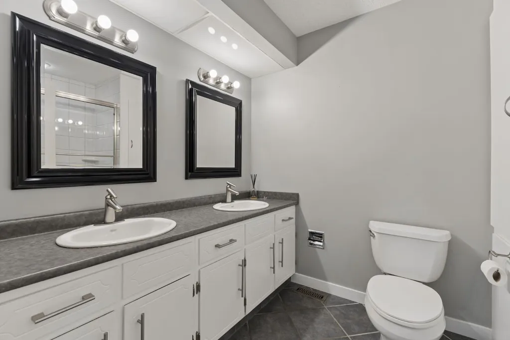 692 Woodpark Boulevard SW Calgary AB T2W 3R7