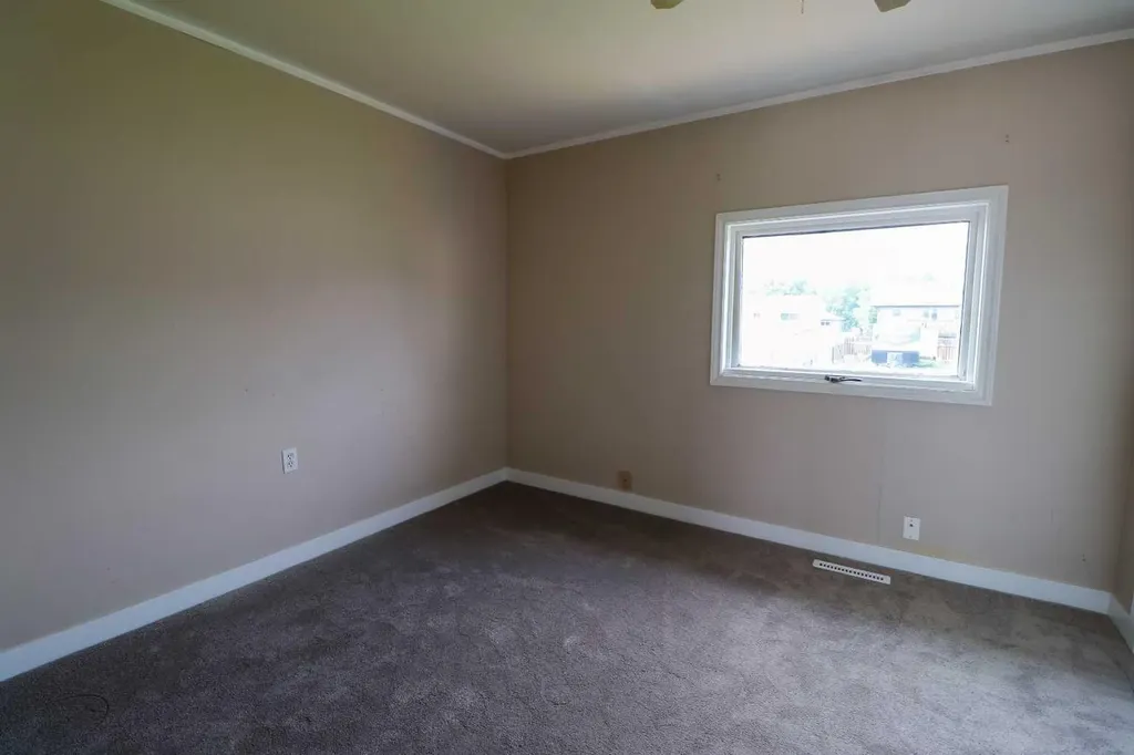 5023 42 Avenue Taber AB T1G 1A6
