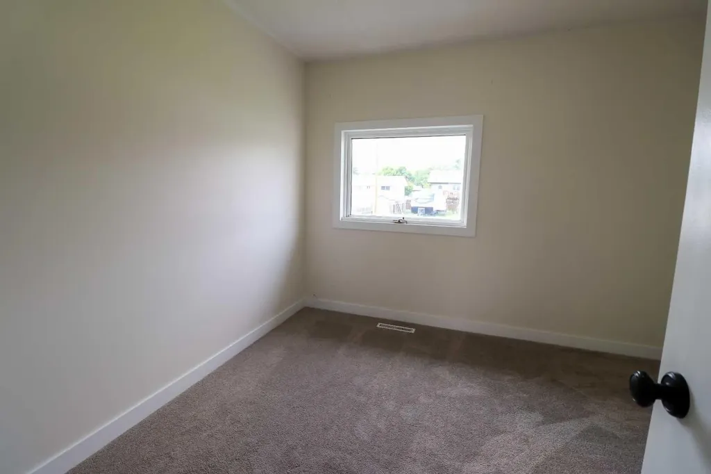5023 42 Avenue Taber AB T1G 1A6