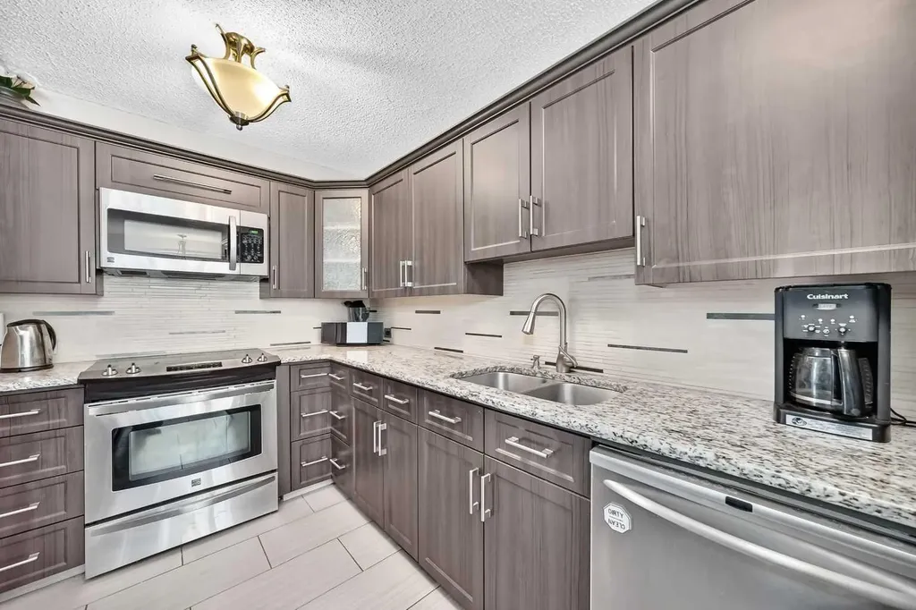 66 Woodmeadow Close SW Calgary AB T2W 4L8